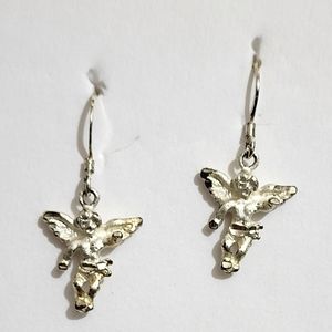 vintage White gold cherub dangle pierced earrings. Like new condition